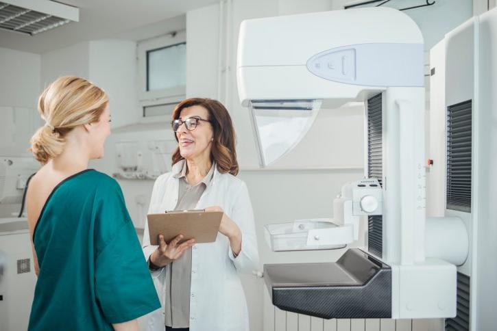 Woman talking to provider about mammogram